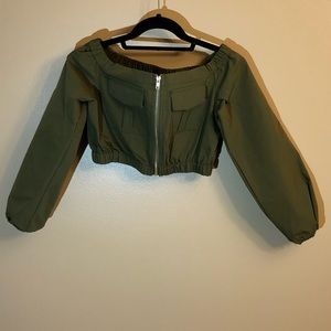 Green off the shoulder long sleeve crop top.